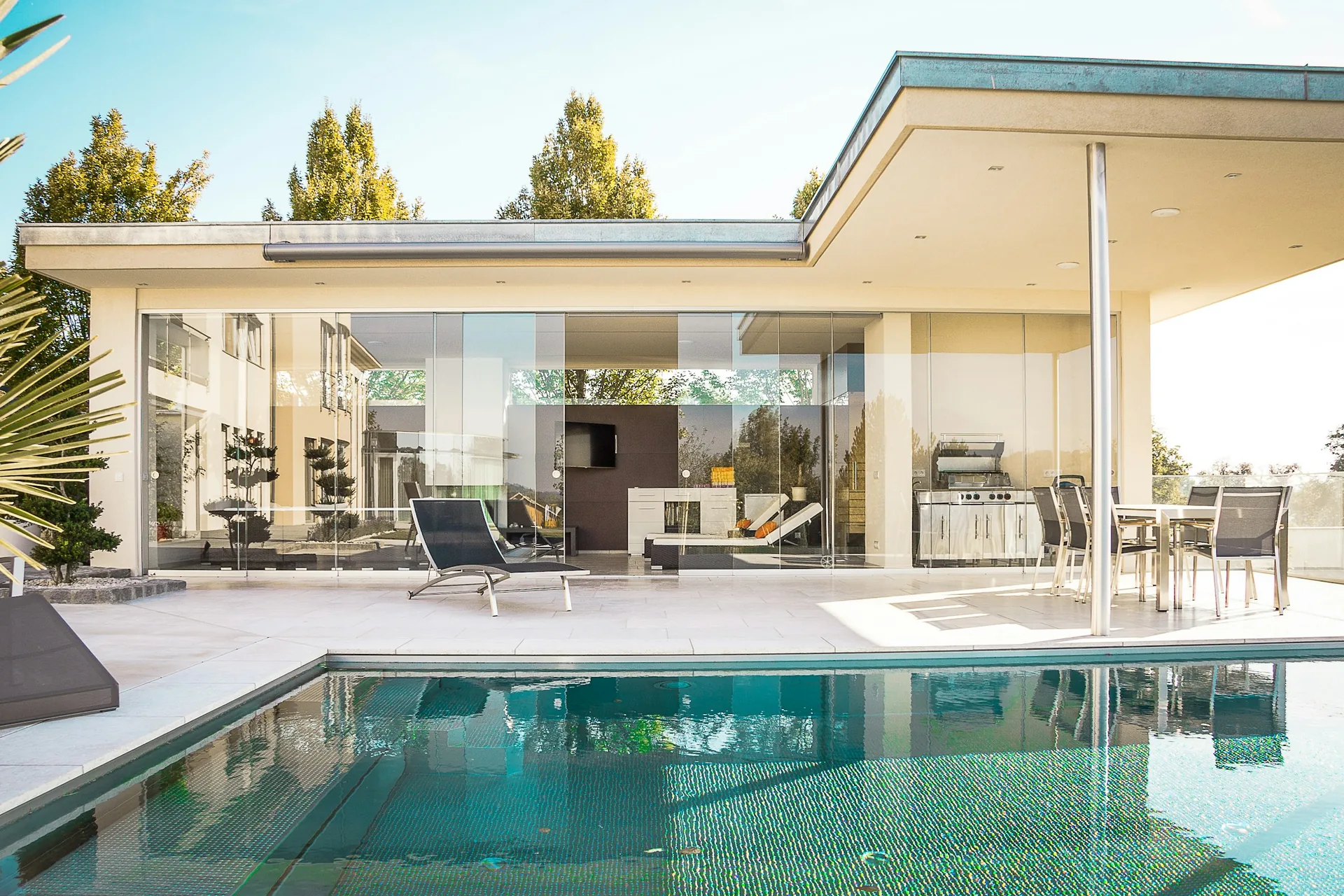 Modern residential architecture beside a swimming pool